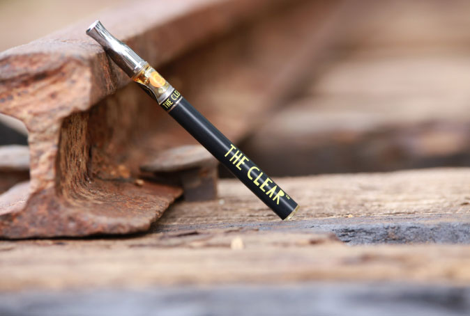 Vape Leaning against Metal Beam Vape Leaning against Metal Beam